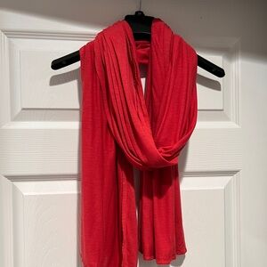 Gap scarf in pink/coral color approximately 80”x23”, 70% rayon, 30%tencel